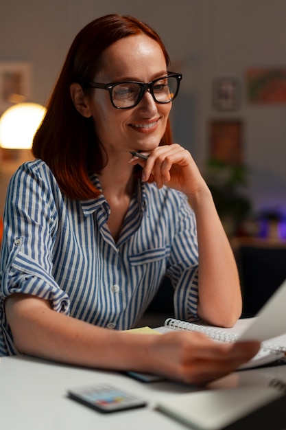 Free Photo medium shot woman relaxing at home