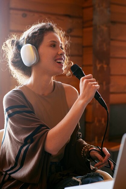 Medium shot woman singing country music