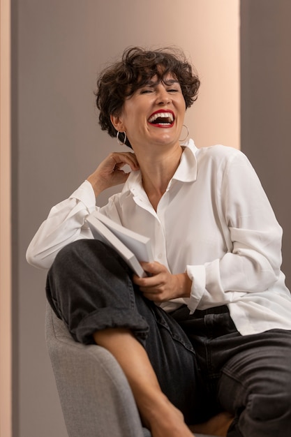 Medium shot woman sitting on chair