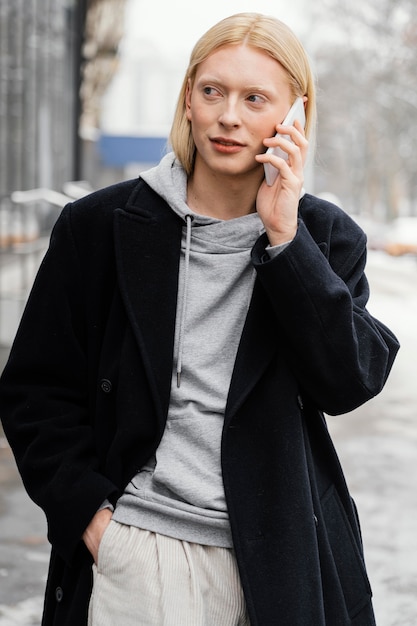 Medium shot woman  talking on phone