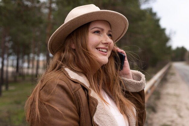 Medium shot woman talking on phone