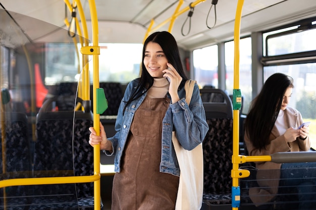 Medium shot woman talking on phone