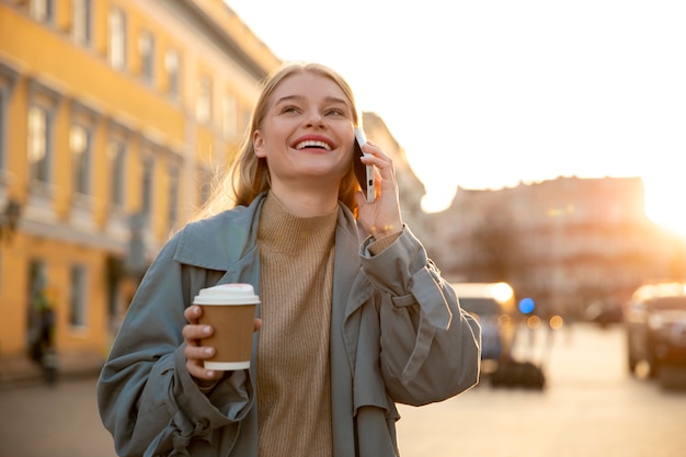 Medium shot woman talking on phone