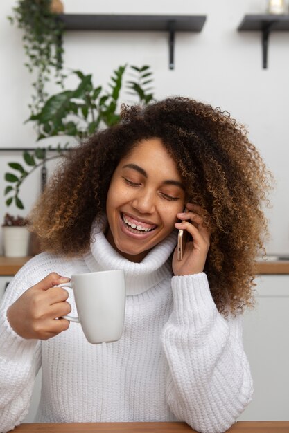 Medium shot woman talking on phone