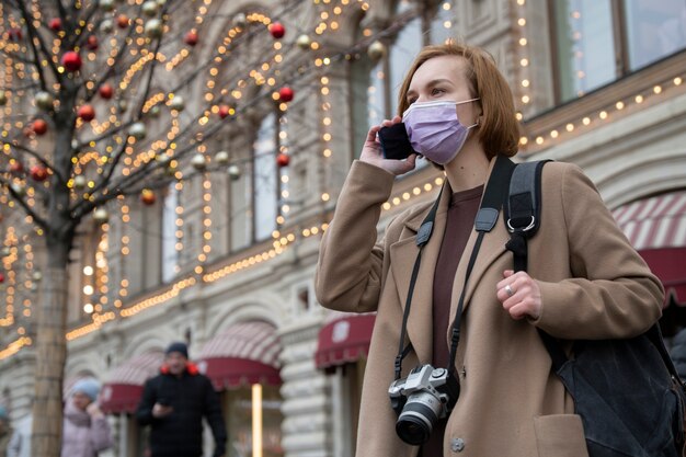 Medium shot woman talking on phone