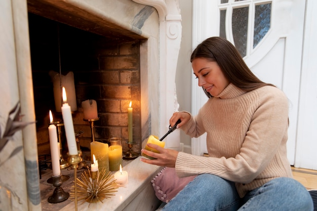 Free Photo medium shot woman using lighter