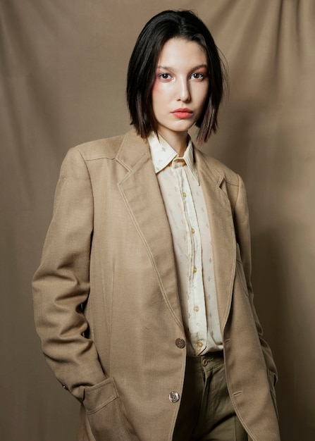 Free Photo medium shot woman wearing a blazer