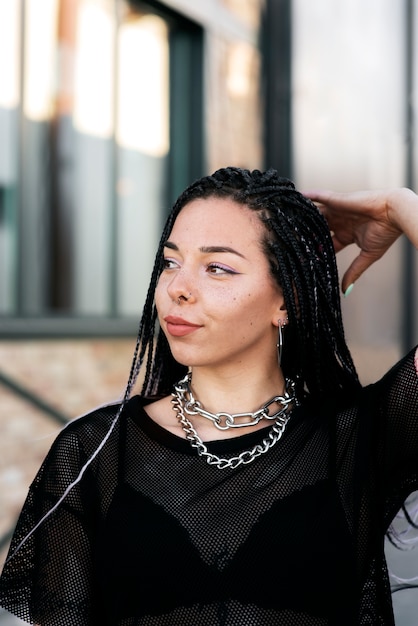 Free photo medium shot woman wearing chain necklace