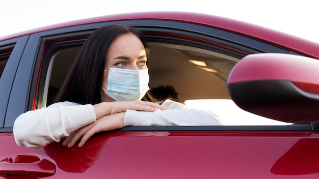 Medium shot woman wearing medical mask