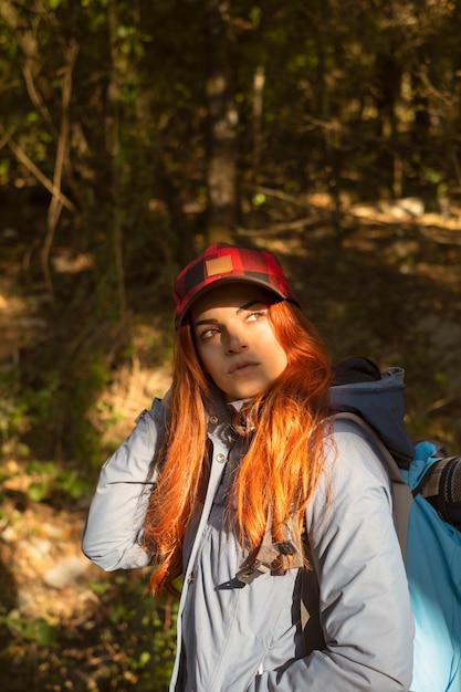 Free photo medium shot woman with backpack