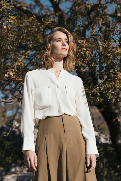 Free Photo medium shot woman with casual outfit looking sideways