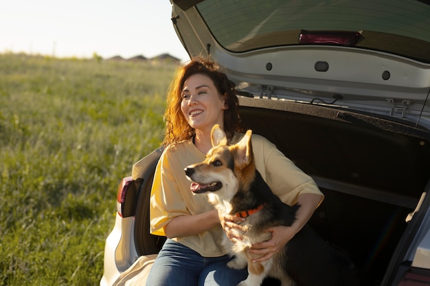 Free photo medium shot woman with cute dog