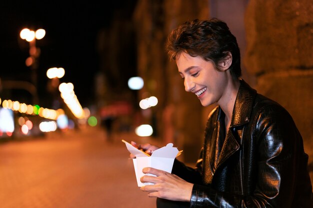 Medium shot woman with food