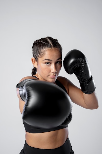 Medium shot woman with gloves