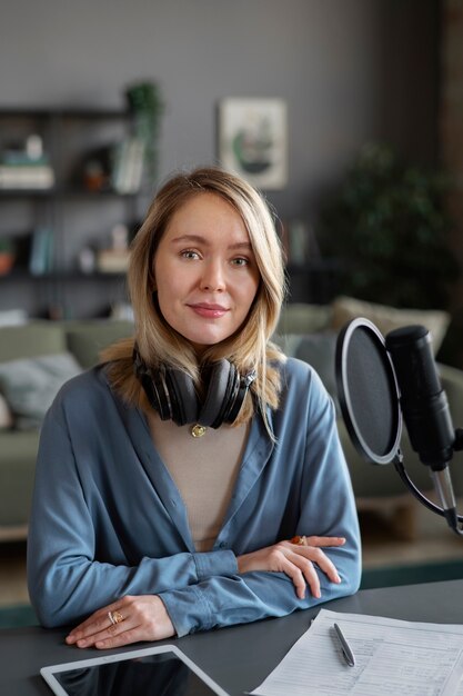 Medium shot woman with headphones