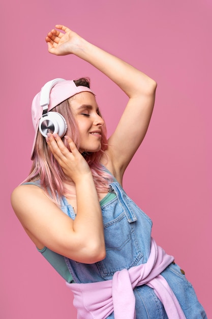 Medium shot woman with headphones