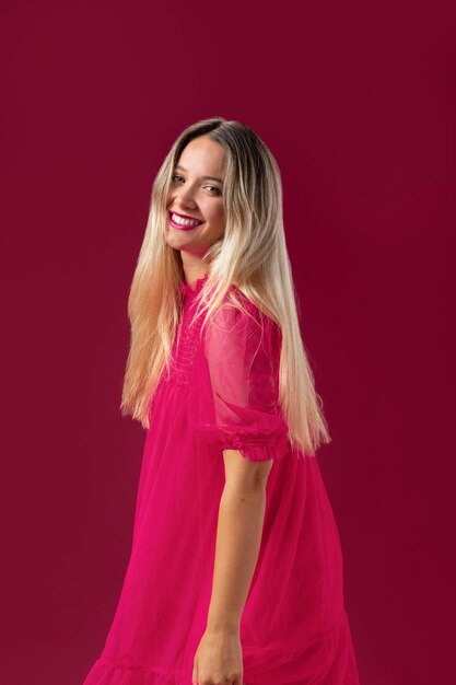 Medium shot woman with pink outfit