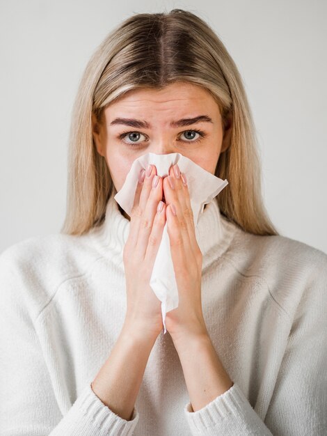 Medium shot woman with tissue