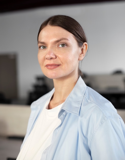 Medium shot woman at work portrait