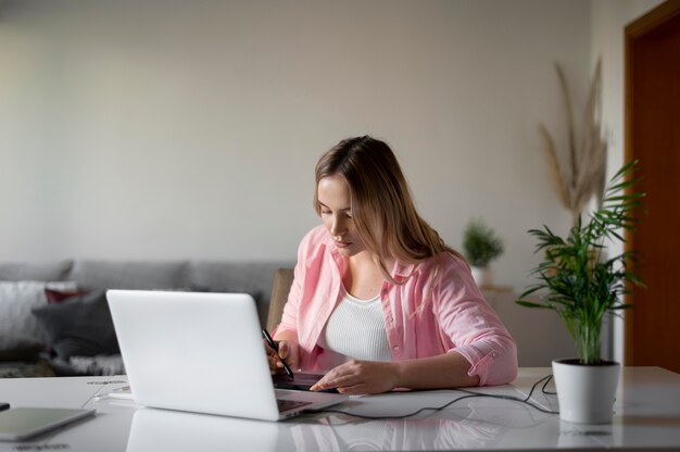 Medium shot woman working