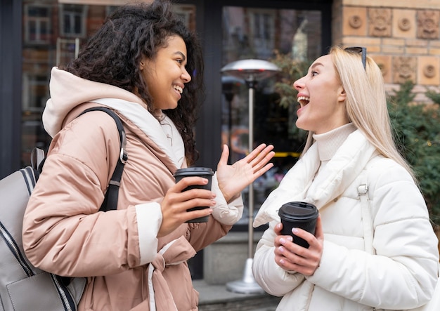 Medium shot women chatting