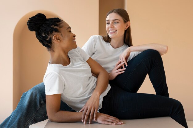 Medium shot women laughing together