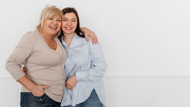 Medium shot women posing together