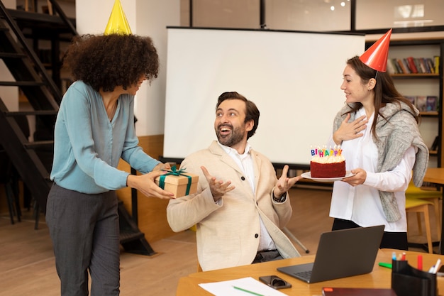 Medium shot women surprising worker