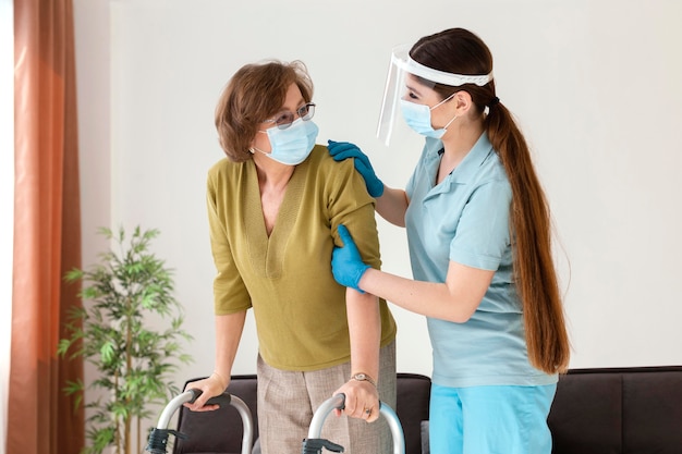 Medium shot women wearing masks