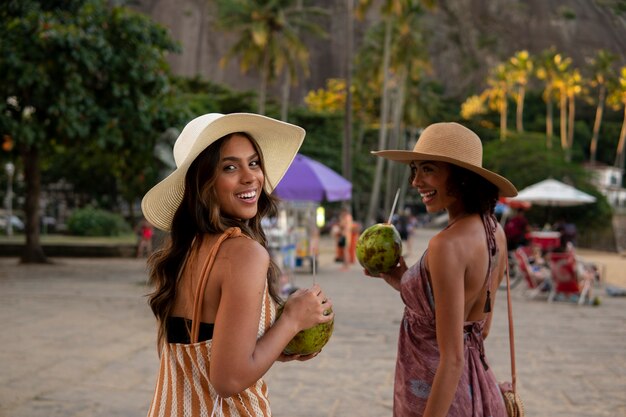 Medium shot women wearing vacation outfits