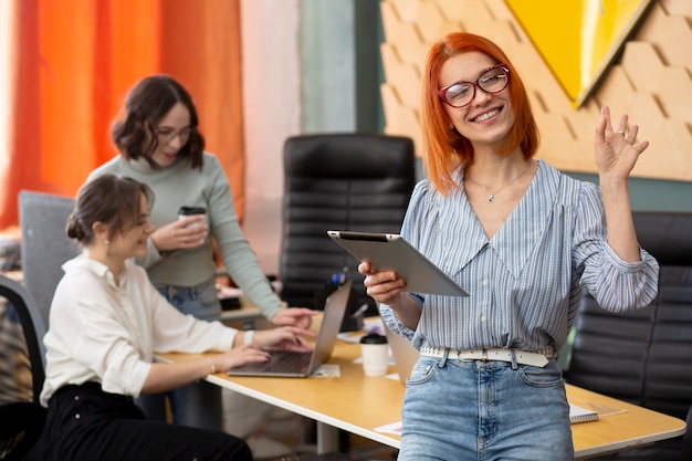 Medium shot women working as team