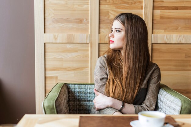 Melancholy girl looking to the side