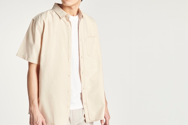 Free Photo men in beige shirt minimal outfit