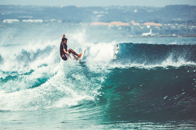 Free photo men and girls are surfing