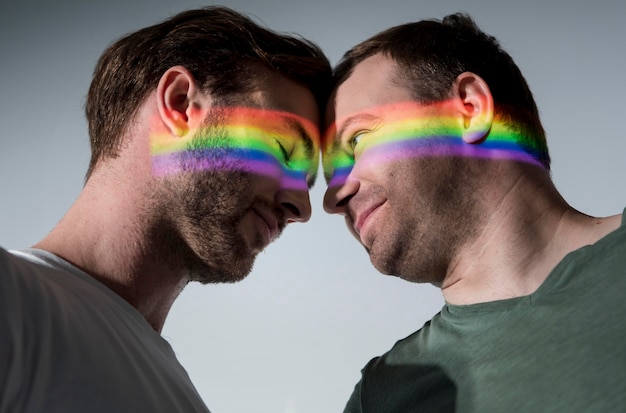 Free photo men loving each other with lgbt symbol