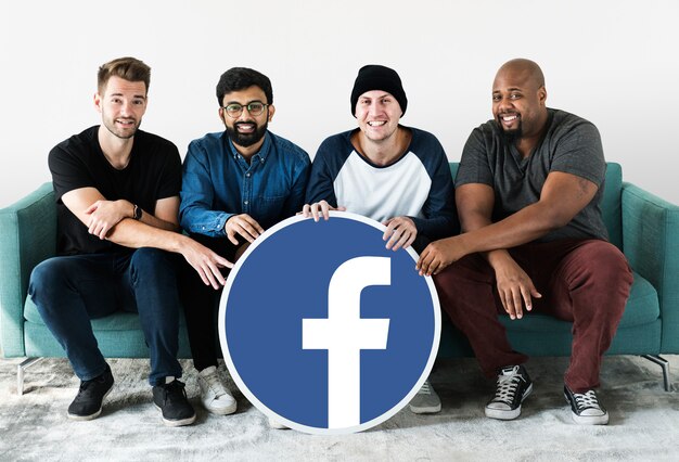 Men showing a Facebook icon