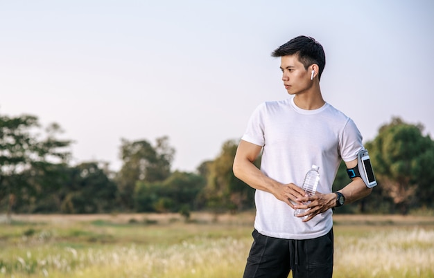 Men warm up before and after exercising