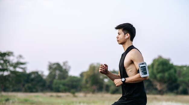 Men and women exercise by running on the road.