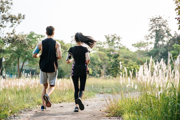 Free photo men and women exercise by running.