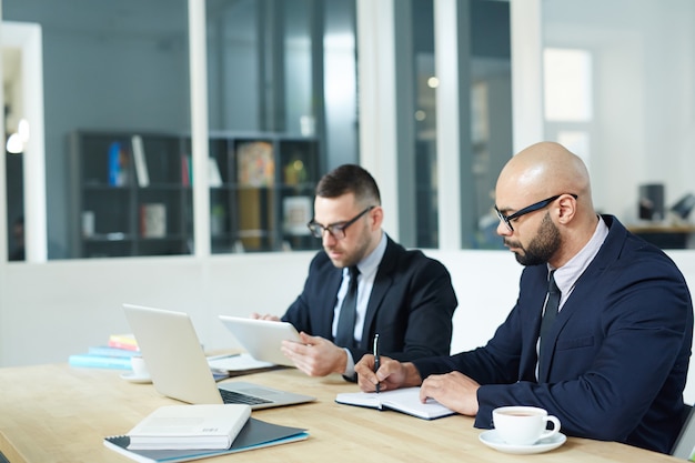 Men working in office