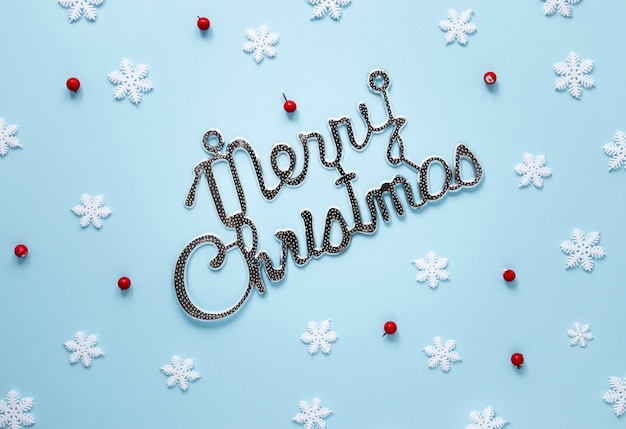 Free Photo merry chistmas sign with snowflakes