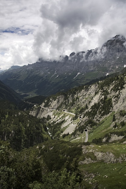 Mesmerizing scenery of the beautiful rocky mountains under a cloudy sky