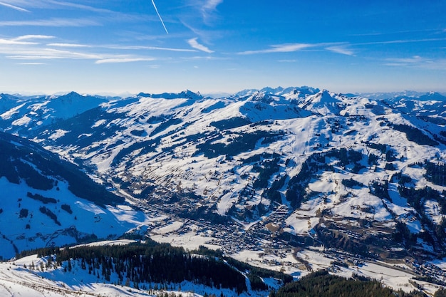 Mesmerizing snow-covered mountains under a blue sky