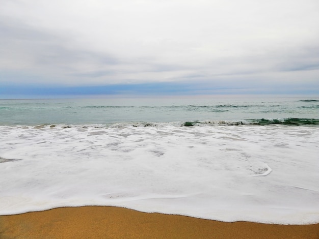 Free photo mesmerizing sunrise over the sandy beach in san sebastian resort town, spain