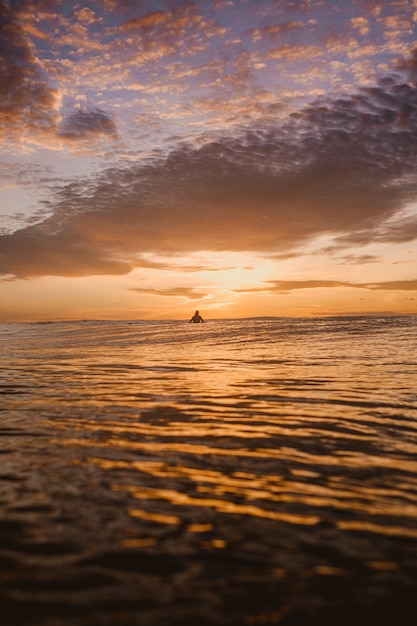 Mesmerizing view of the colorful dawn over the calm ocean in Mentawai islands, Indonesia