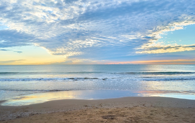 Mesmerizing view of the ocean by the sandy coast