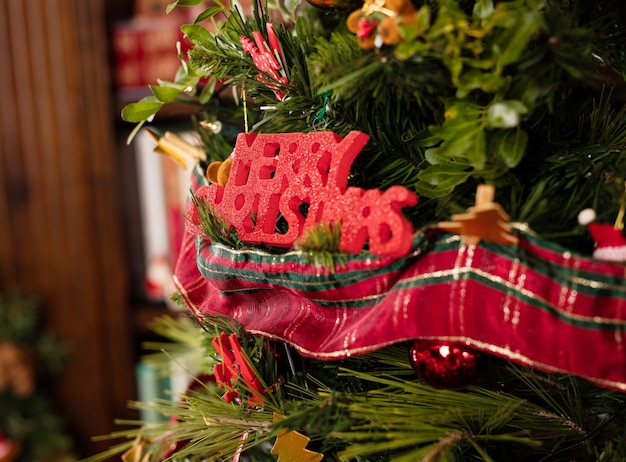 Message "merry christmas" in a tree