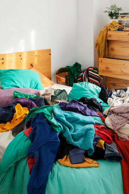 Free photo messy interior full of clothing