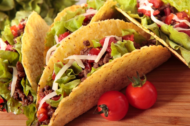 Mexican beef tacos on wooden table