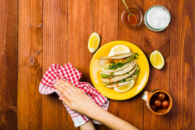 Mexican food concept with tacos on plate